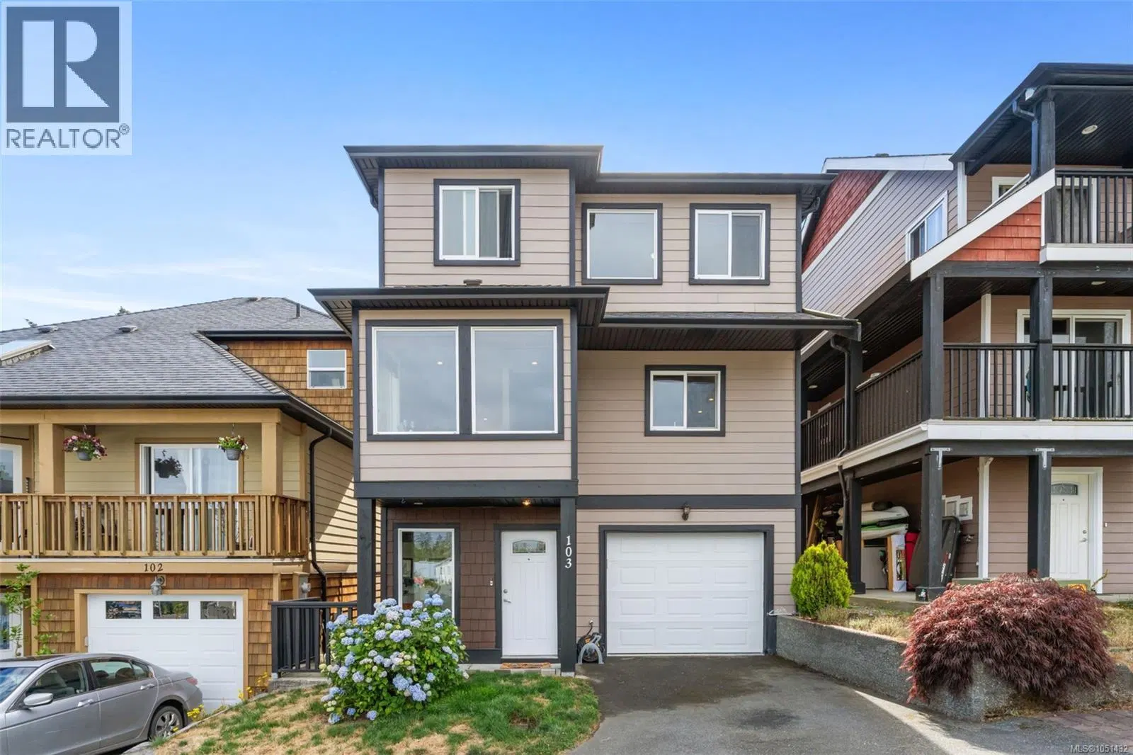 Photo 1 of 32 at #103 – 7091 Grant Road