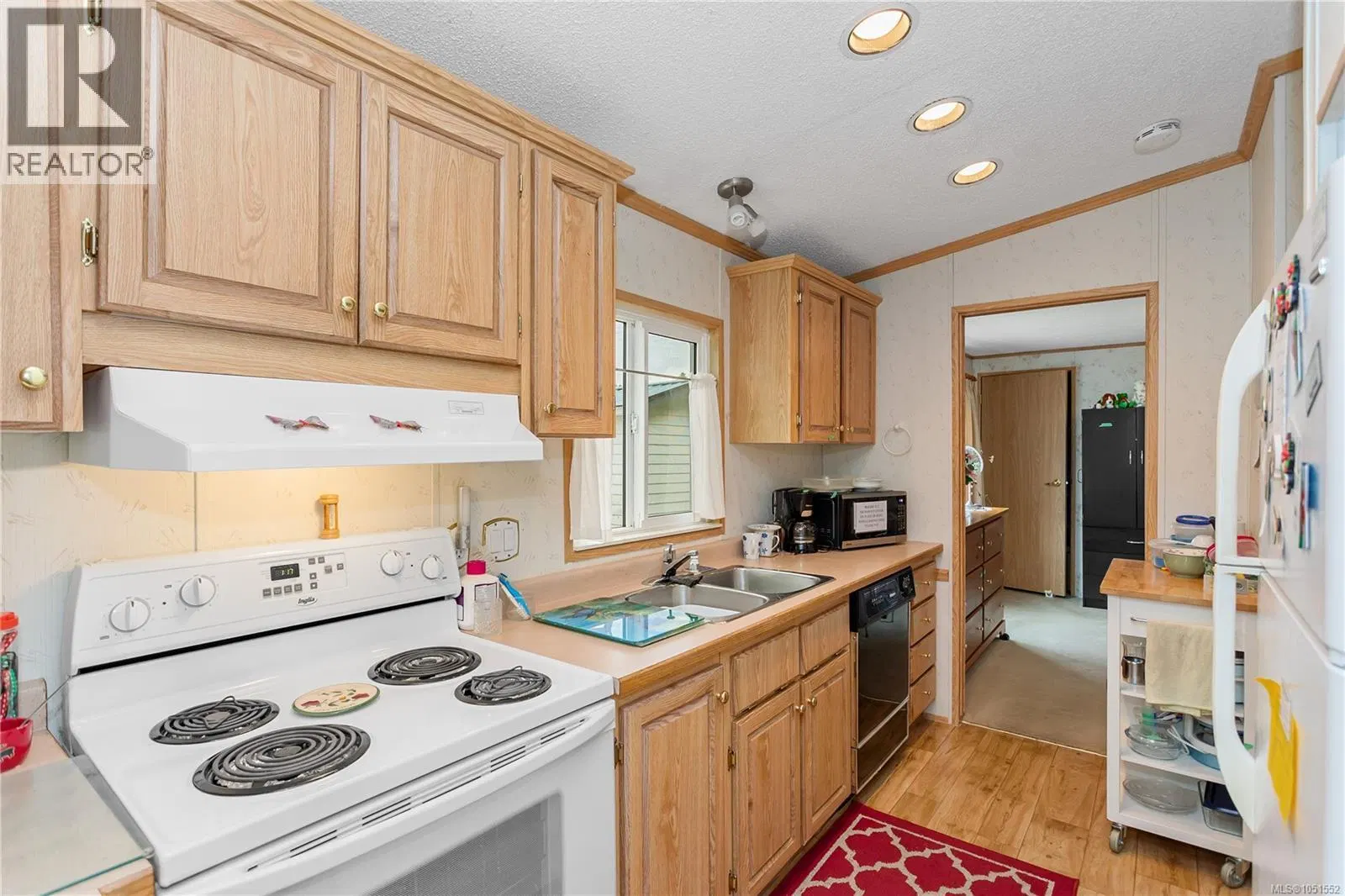 Photo 3 of 20 at #39 – 1048 Murchie Way