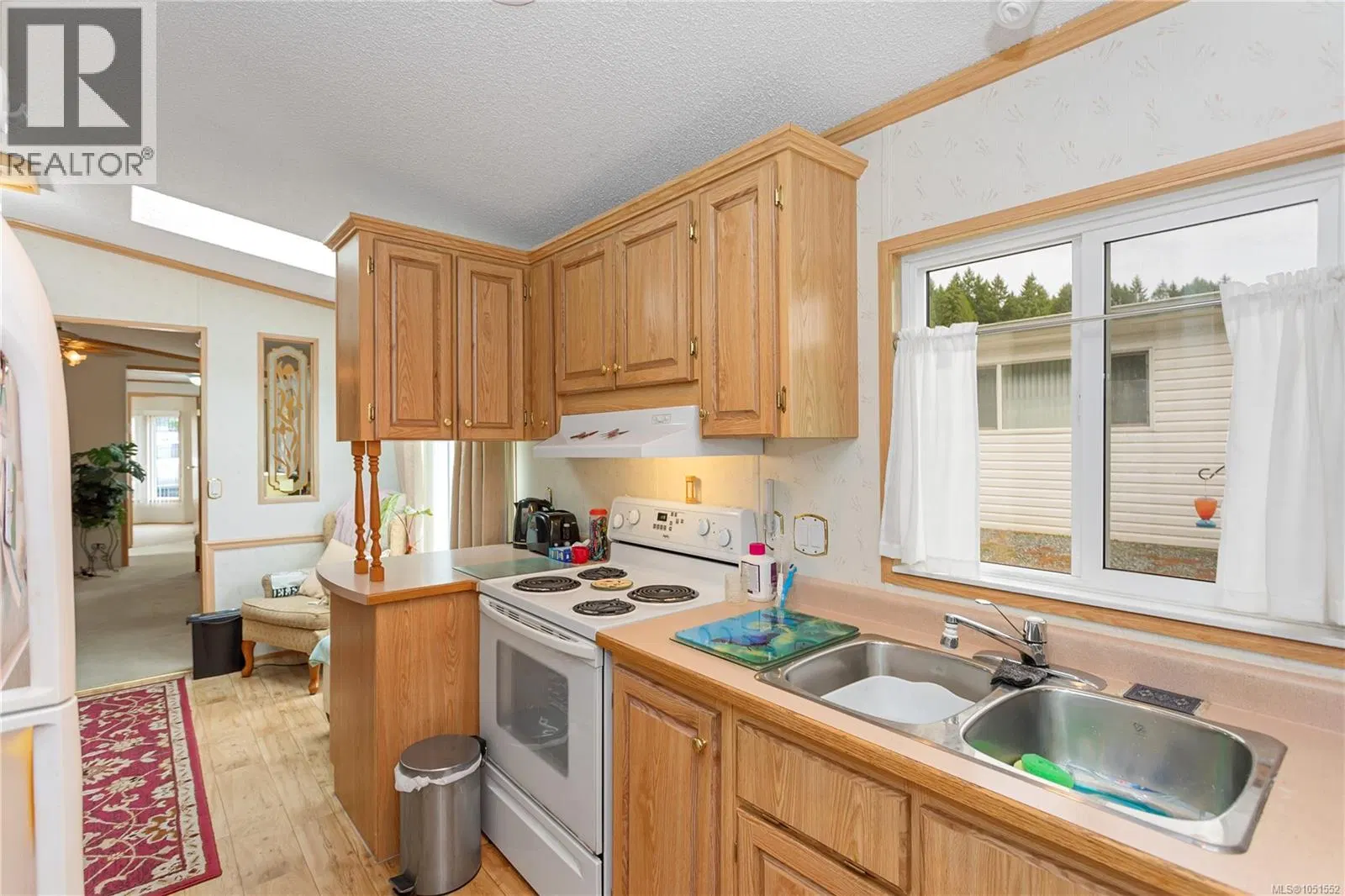 Photo 4 of 20 at #39 – 1048 Murchie Way