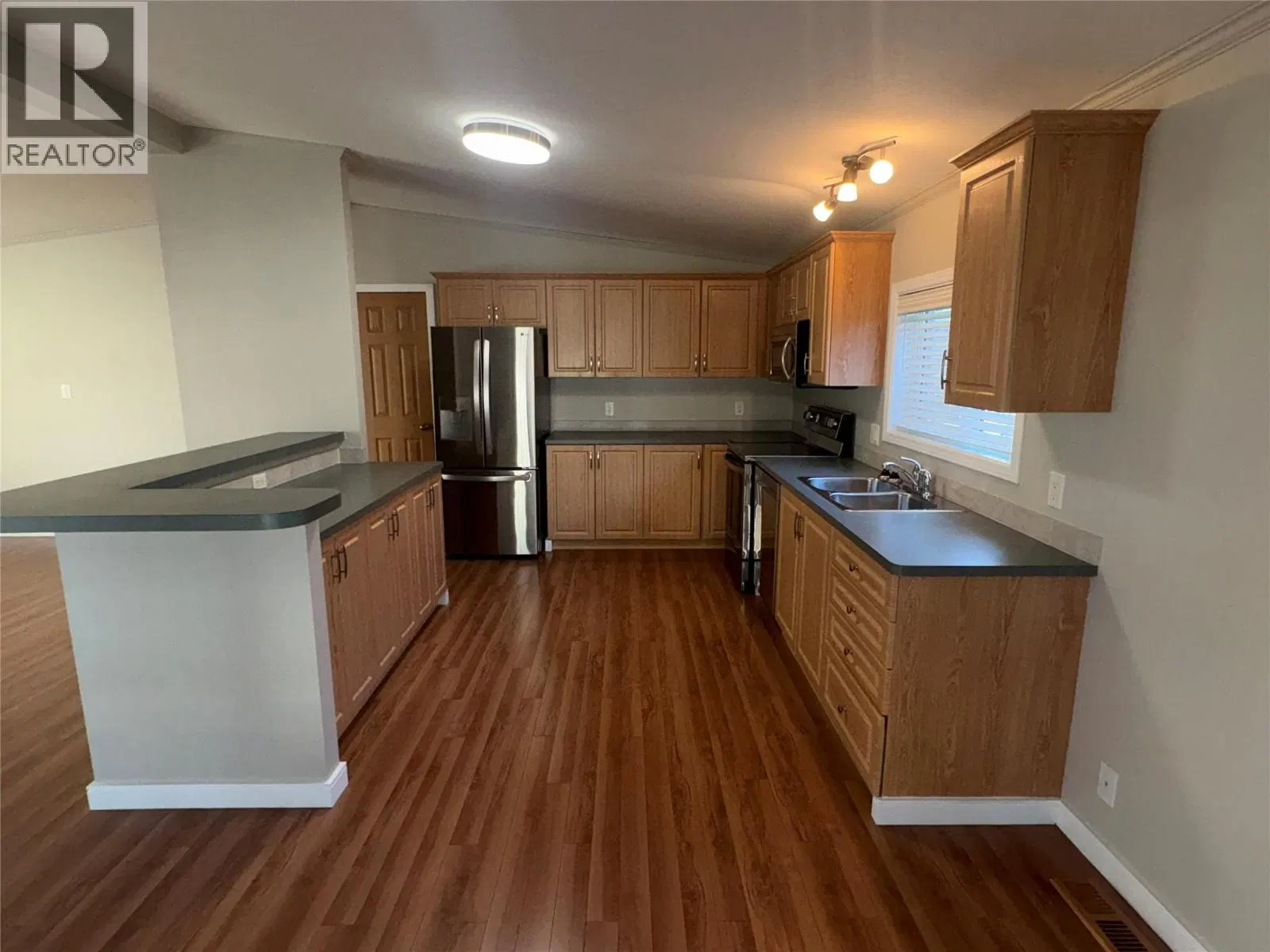Photo 4 of 29 at #114 – 6688 Tronson Road