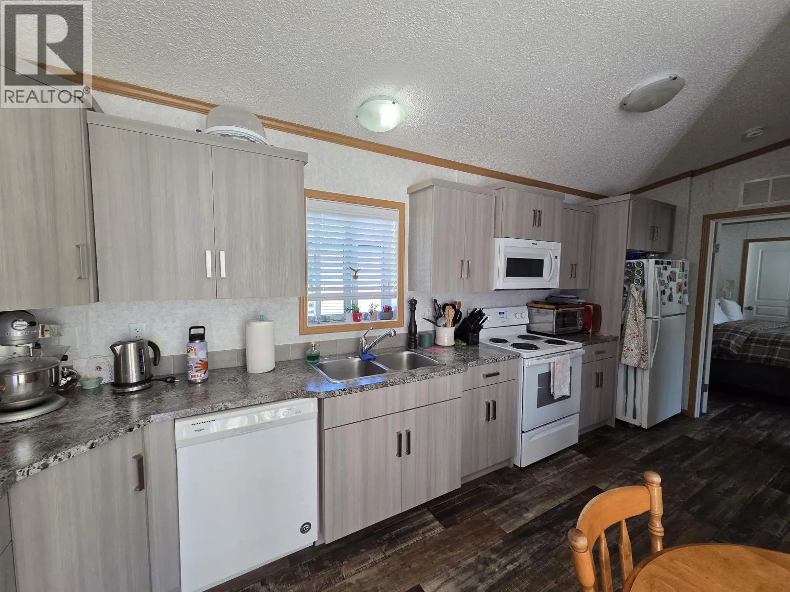 Photo 5 of 20 at #121 – 5204 ACKROYD Street