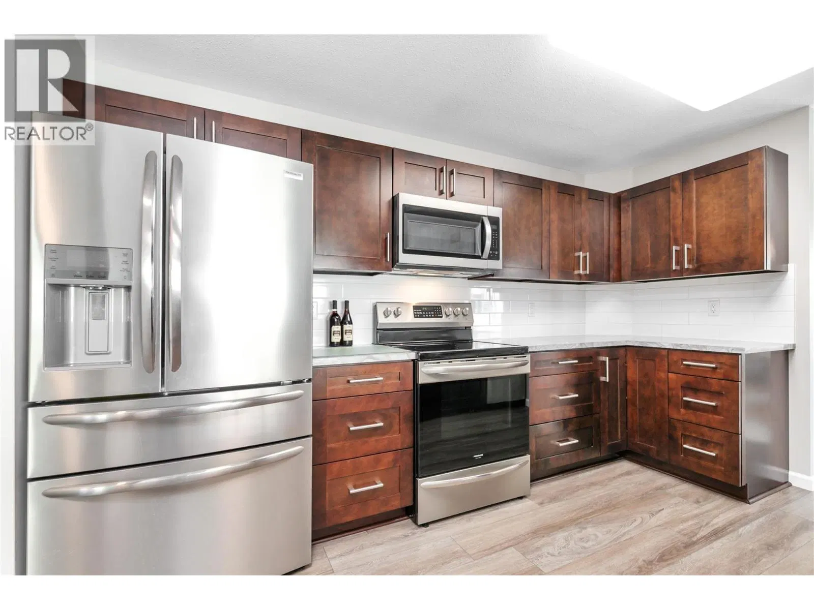 Photo 3 of 40 at #404 – 1329 KLO Road