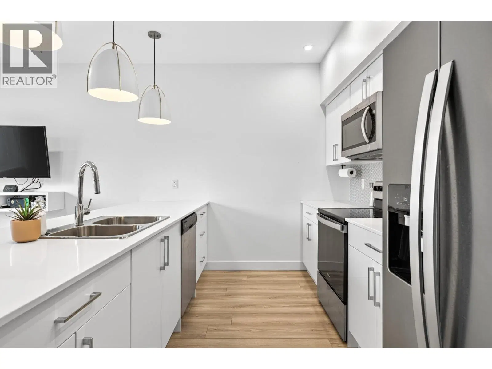 Photo 4 of 46 at #102 – 8960 Dallas Drive