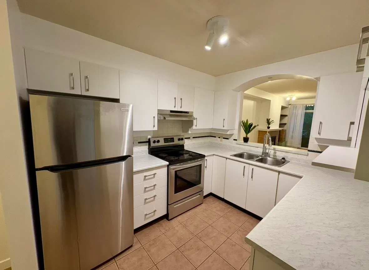 Photo 1 of 16 at #212 – 3600 Windcrest Drive