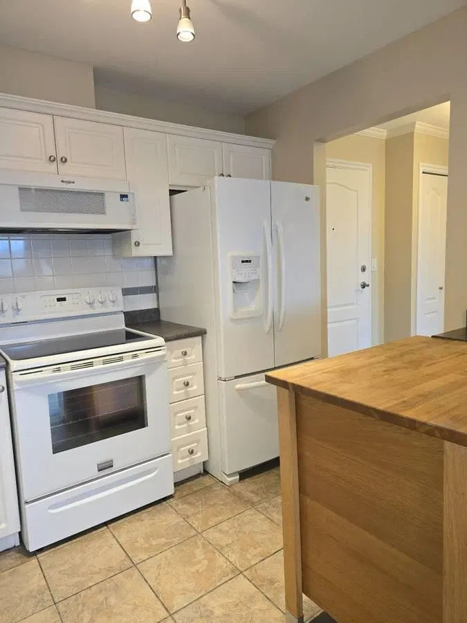 Photo 4 of 18 at #209 – 33150 4th Ave