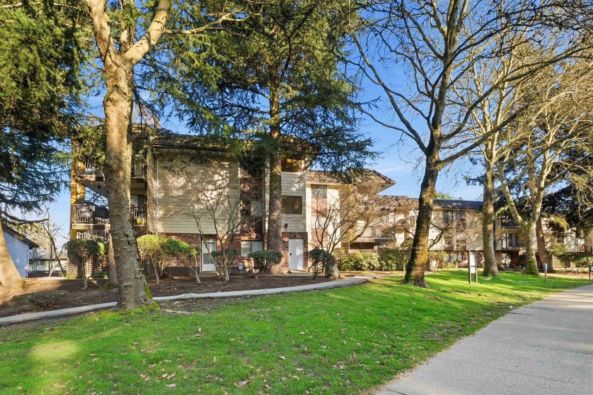Photo 1 of 40 at #211 – 7426 138 Street