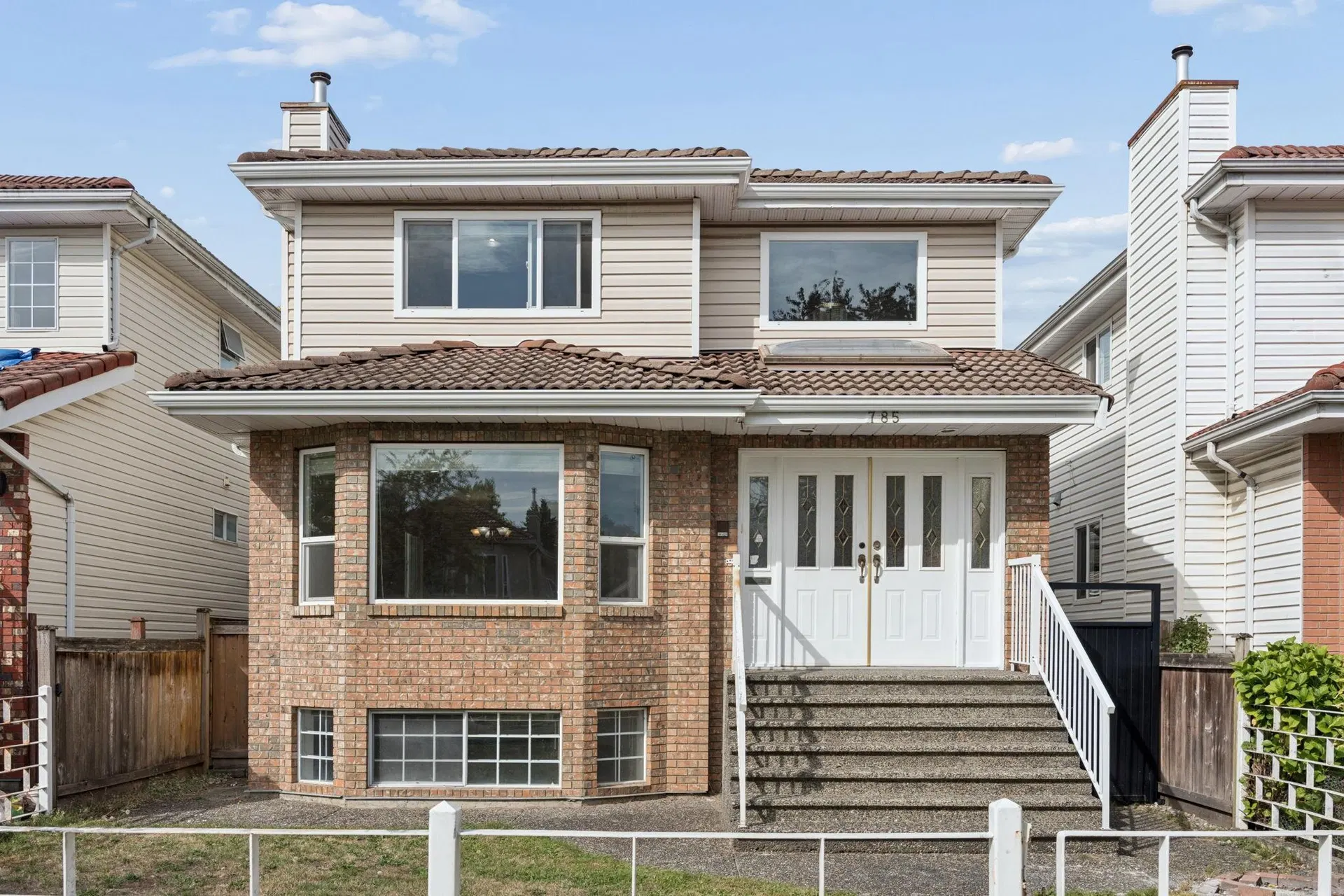 Photo 1 of 33 at 785 E 50th Avenue