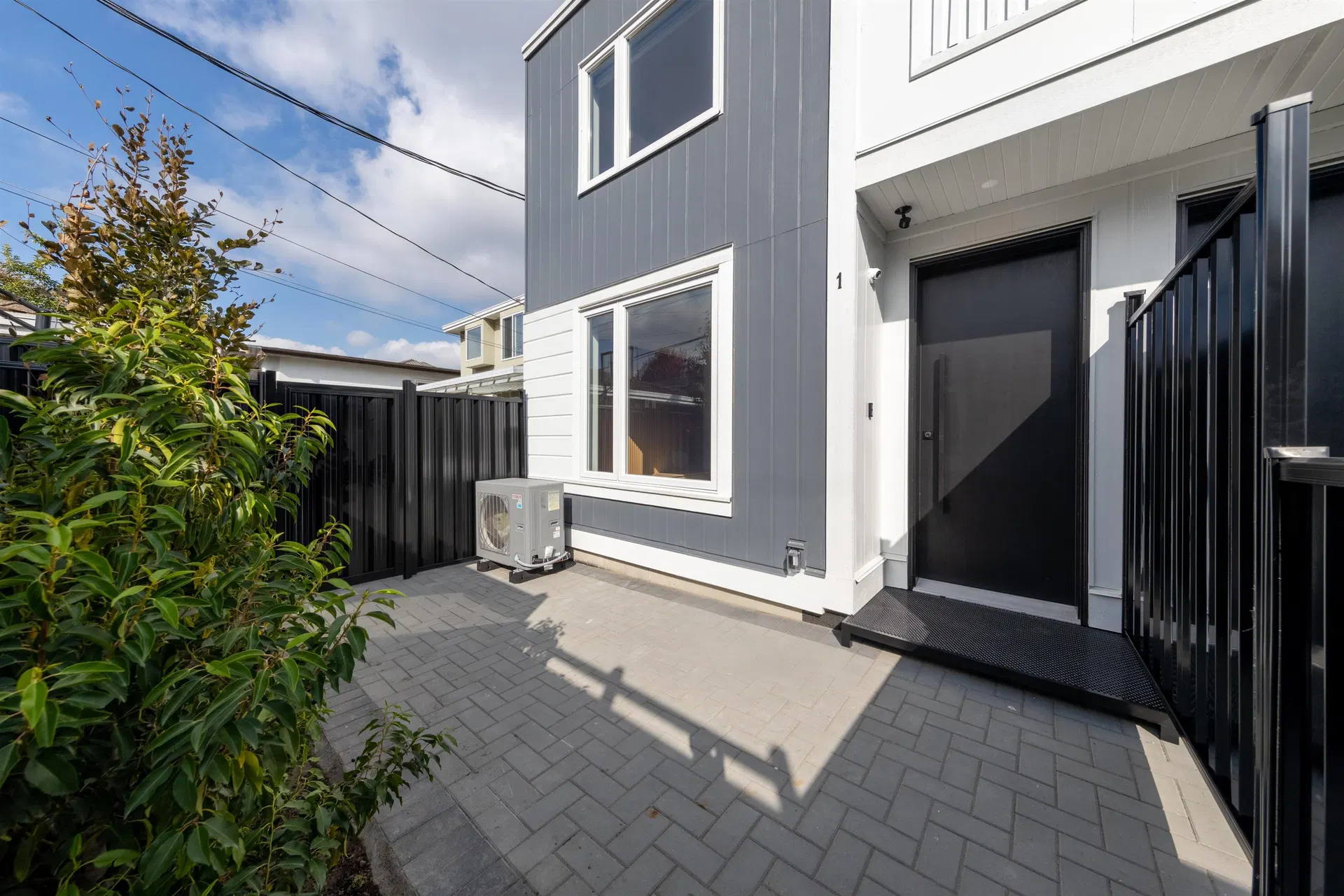 Photo 2 of 39 at #1 – 3268 E 18 Avenue