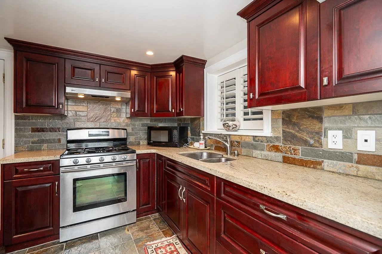 Photo 5 of 40 at 1562 W 62nd Avenue