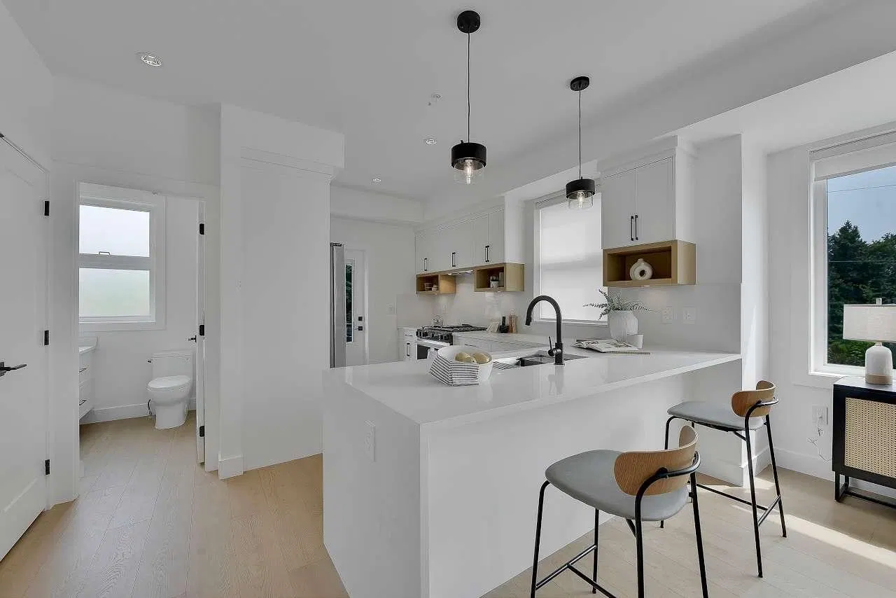 Photo 4 of 32 at #8 – 7540 Briskham Street