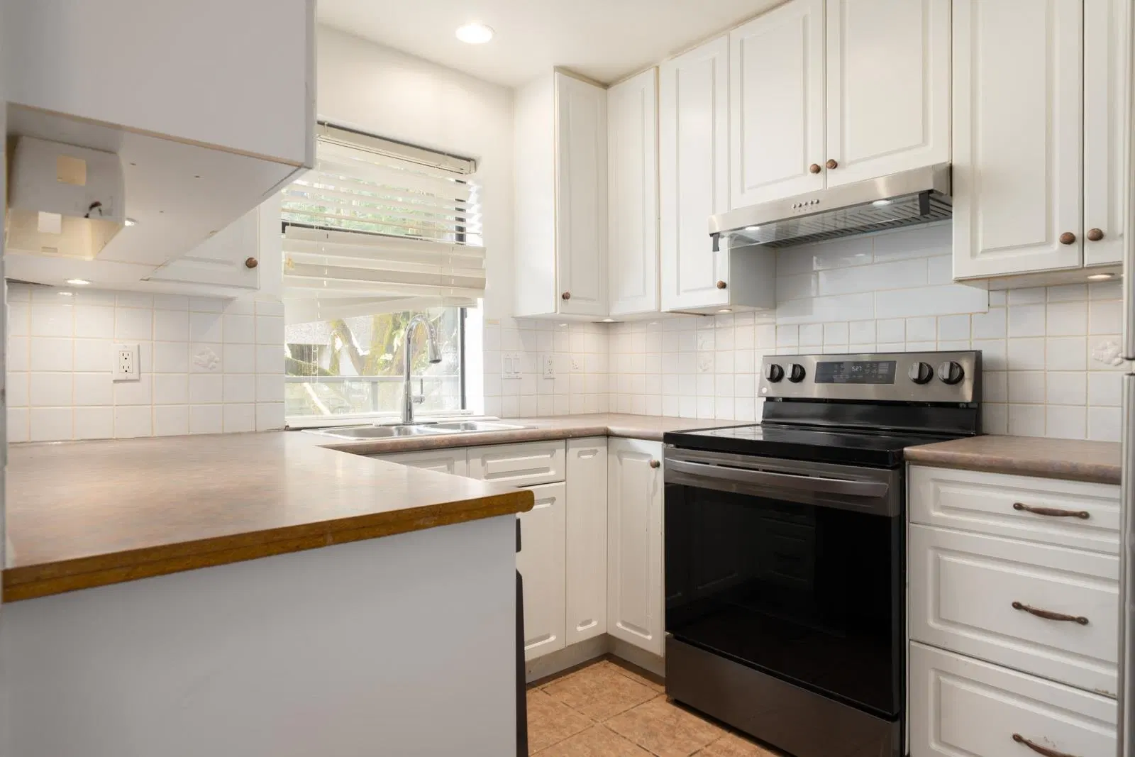 Photo 2 of 14 at #111 – 8460 Ackroyd Road