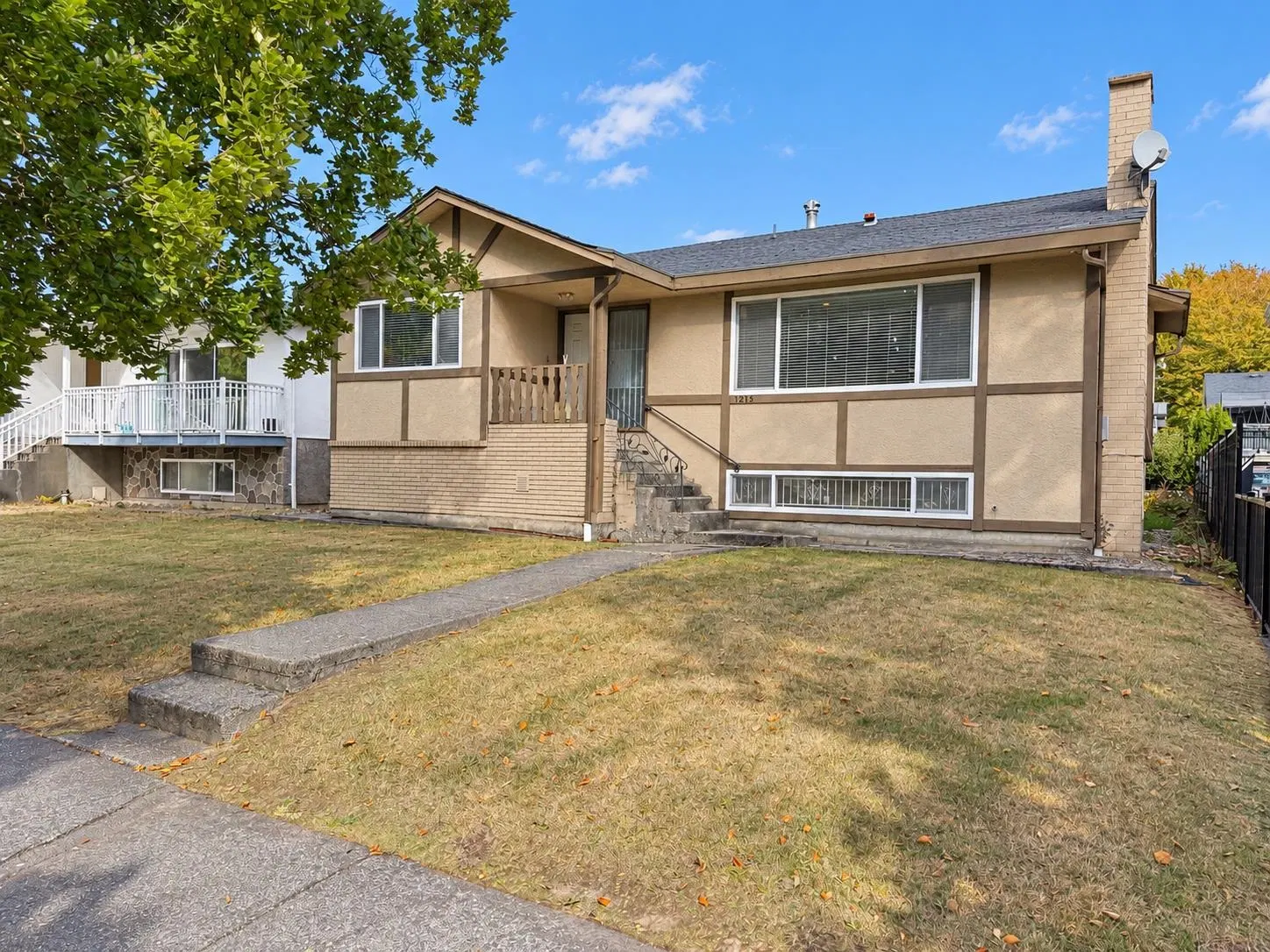 Photo 3 of 39 at 1215 E 48th Avenue