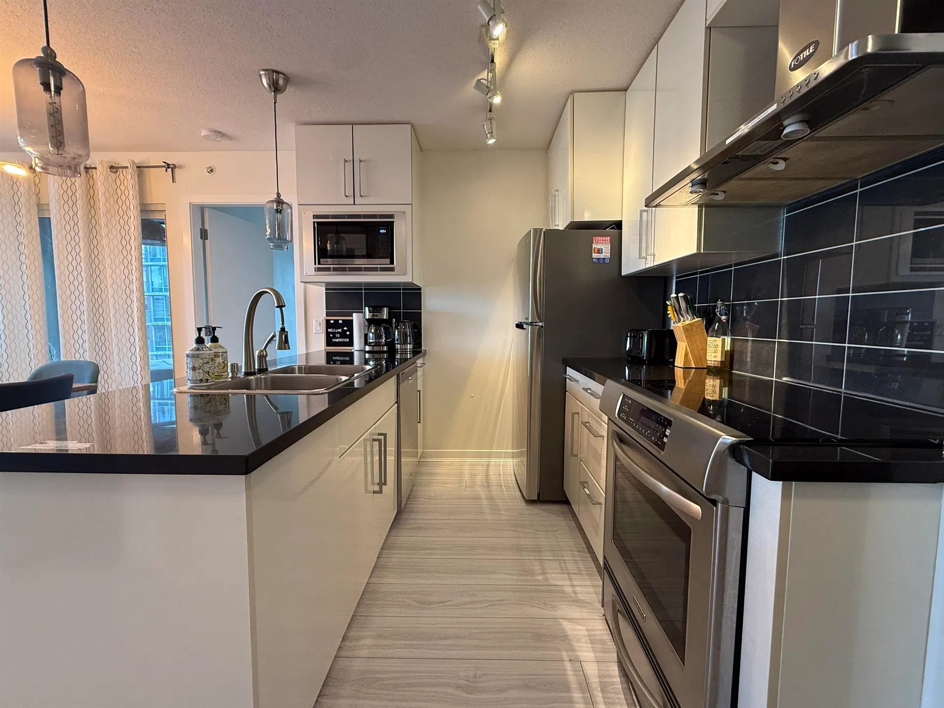 Photo 1 of 10 at #1002 – 689 Abbott Street