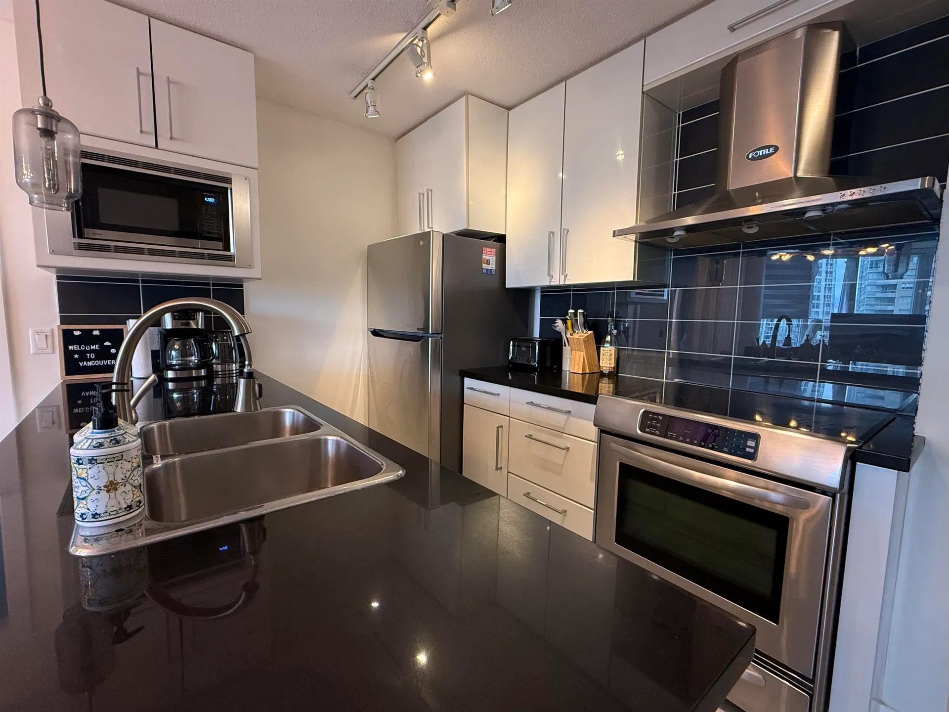 Photo 2 of 10 at #1002 – 689 Abbott Street