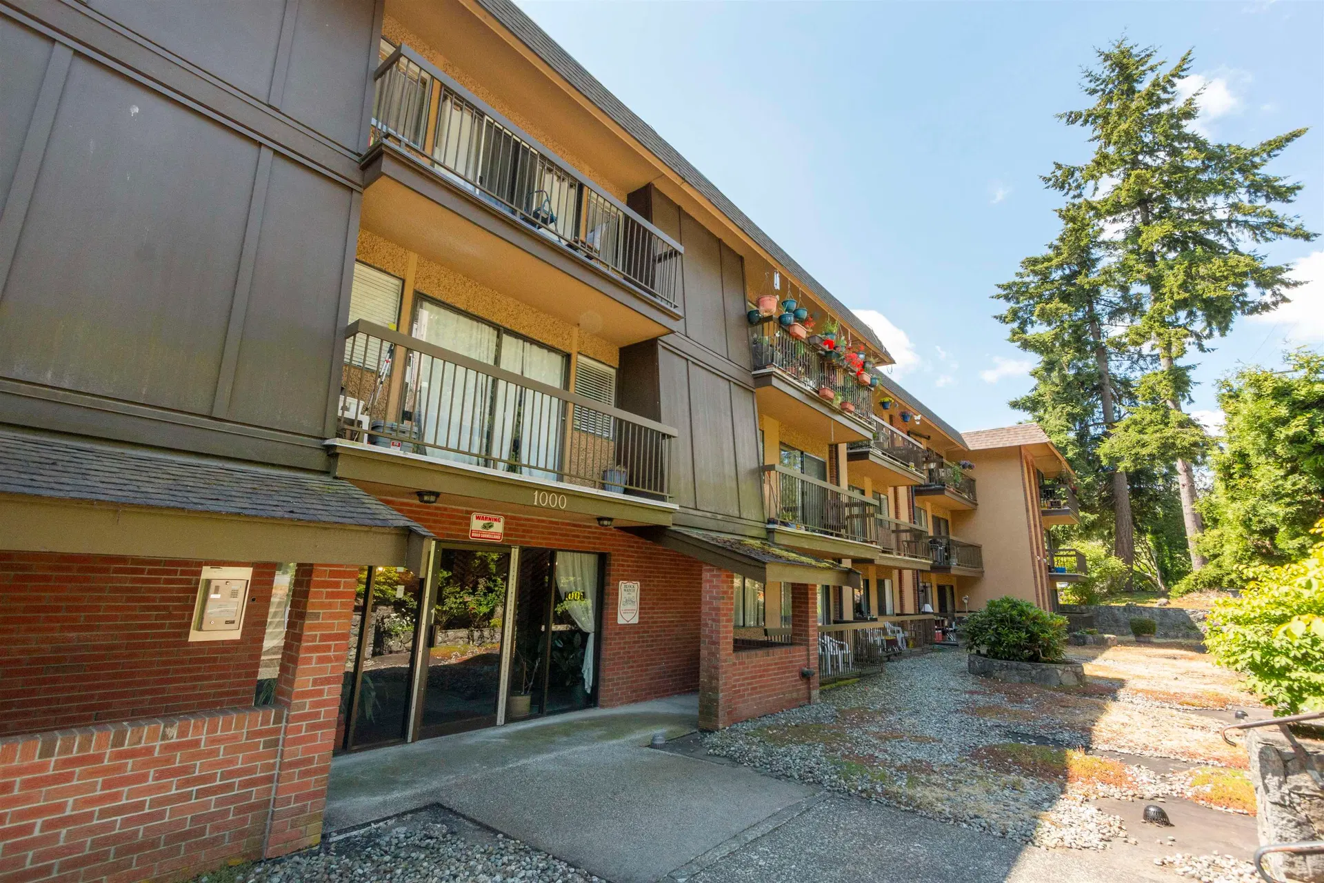 Photo 1 of 18 at #107 – 1000 King Albert Avenue