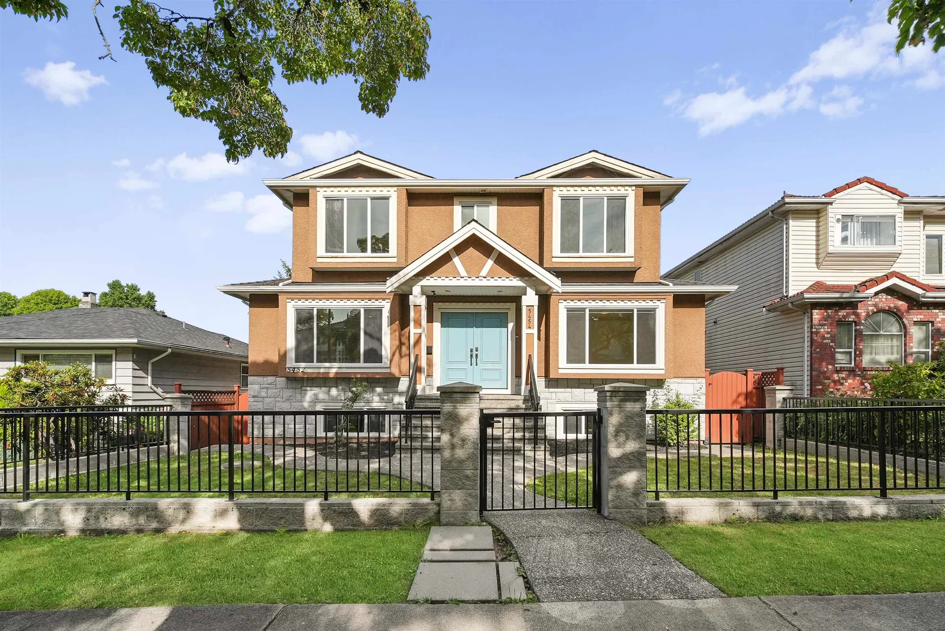 Photo 1 of 37 at 5454 Slocan Street