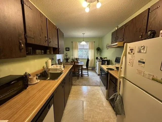 Photo 2 of 19 at #210 – 7426 138 Street