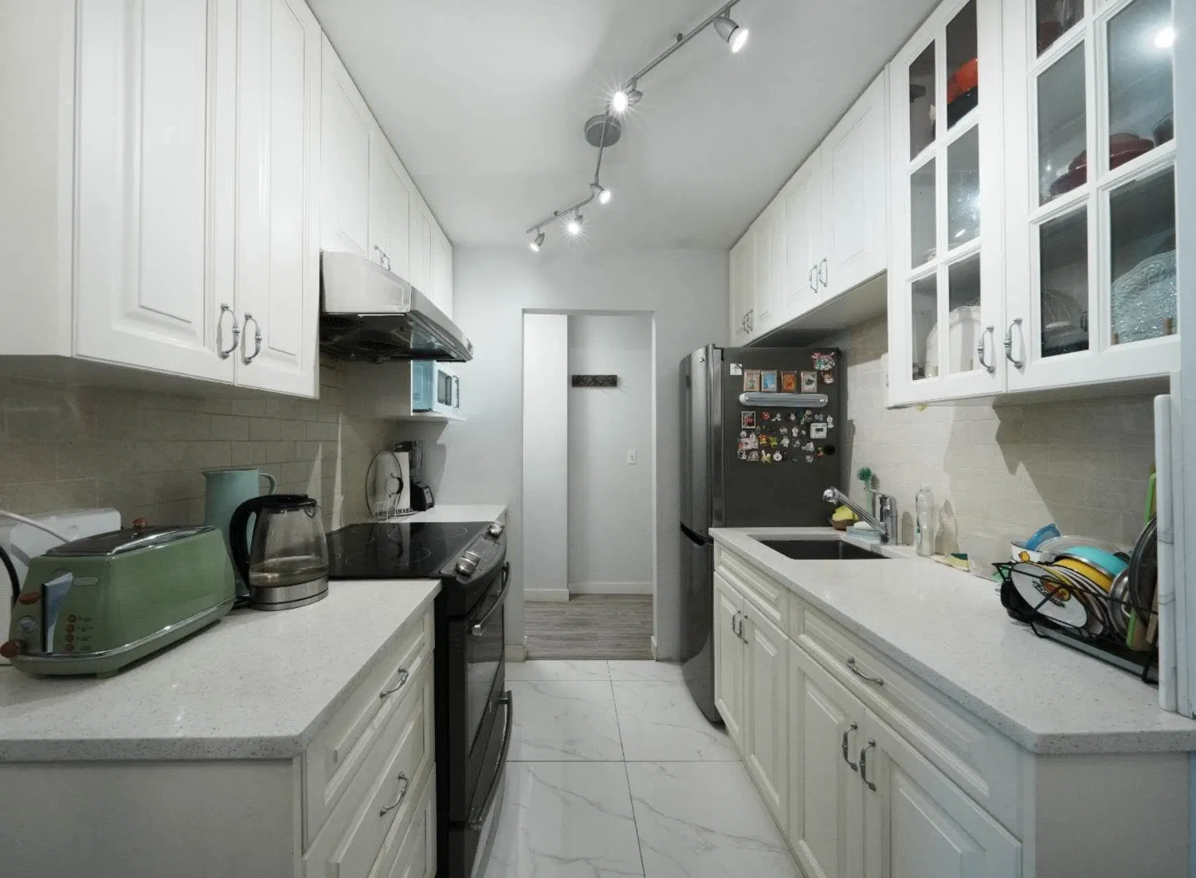Photo 1 of 16 at #106 – 7591 Moffatt Road