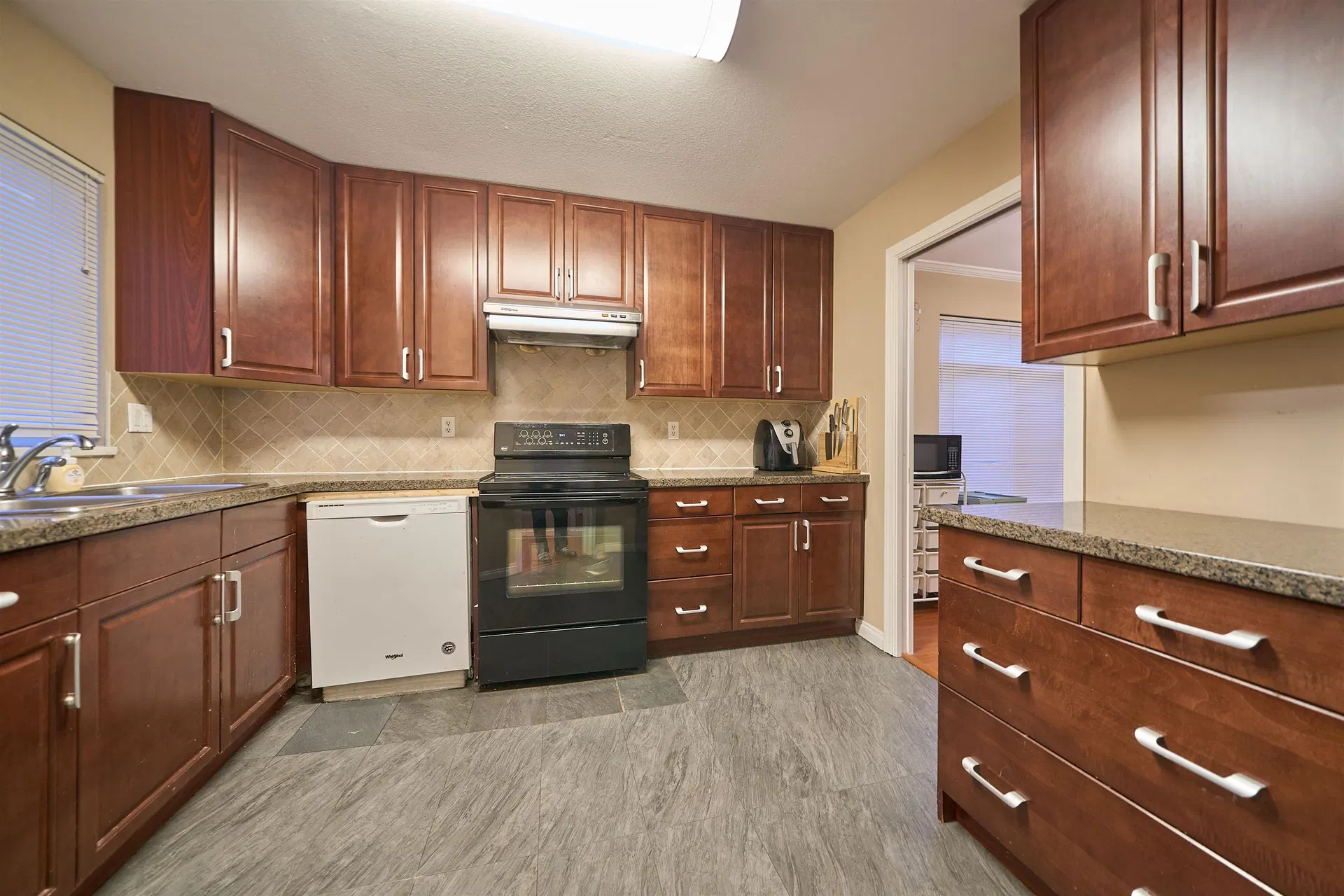 Photo 3 of 12 at #4 – 9700 Blundell Road