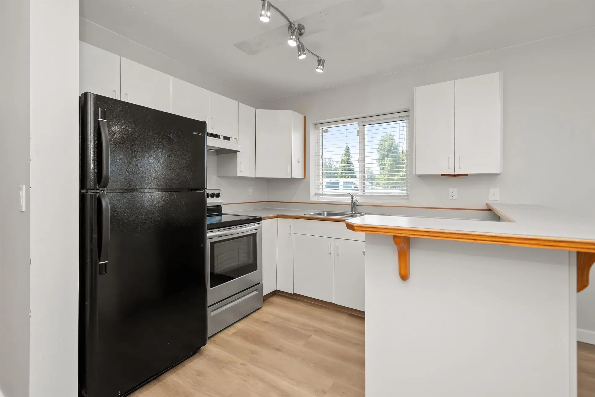 Photo 2 of 30 at #1 – 9206 Corbould Street