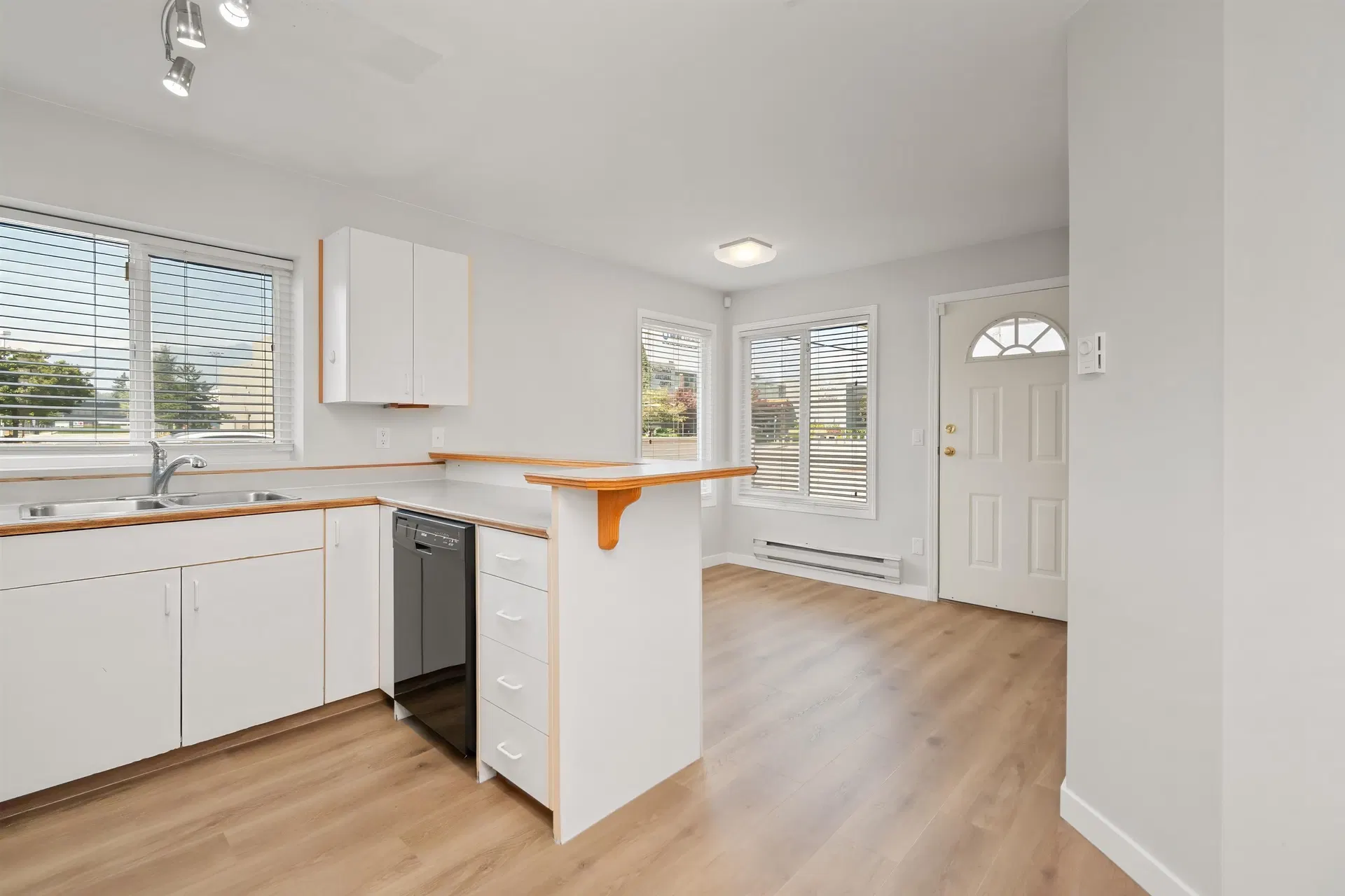 Photo 4 of 30 at #1 – 9206 Corbould Street