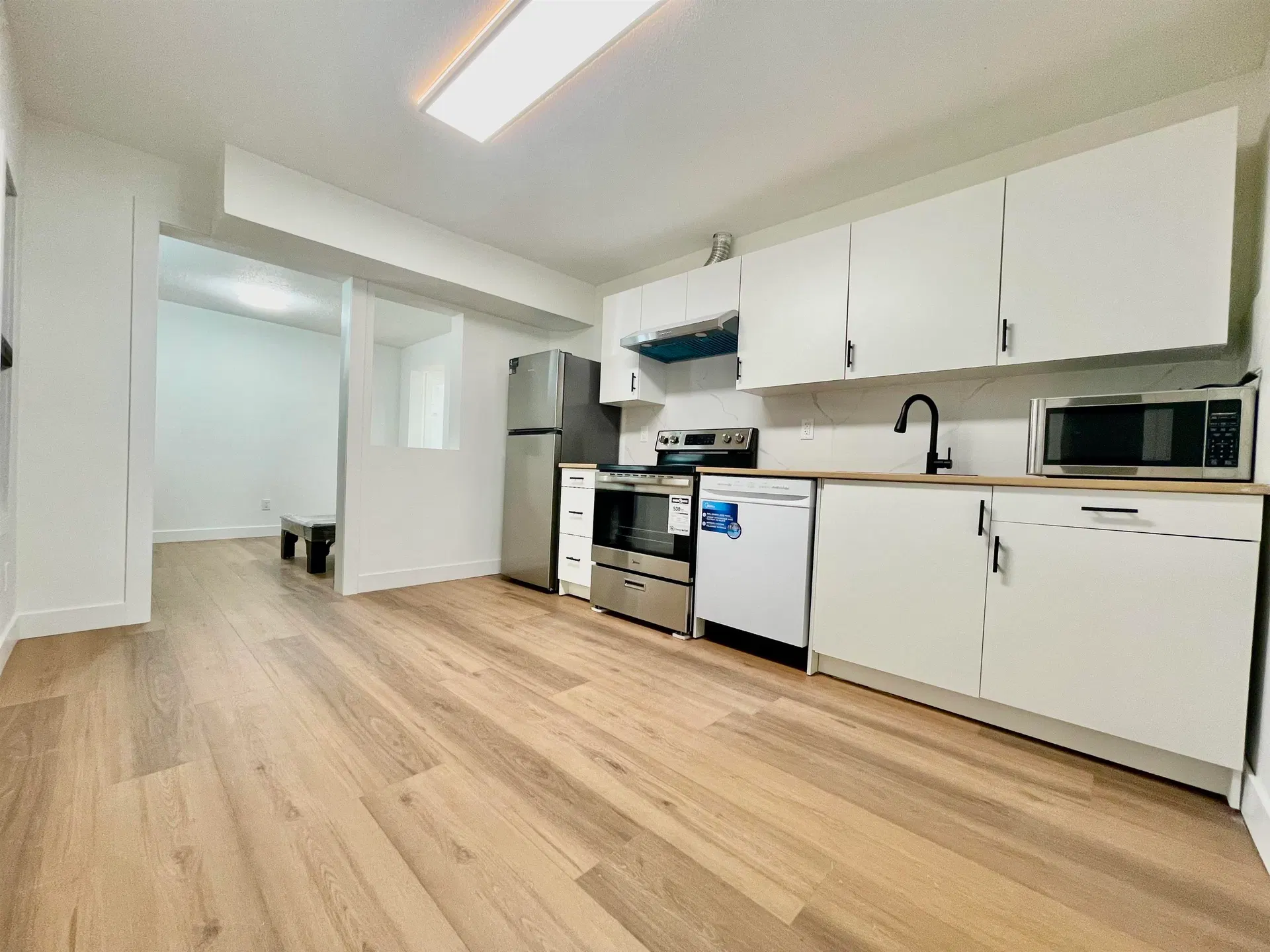 Photo 2 of 10 at lower level – 1695x 84 Avenue