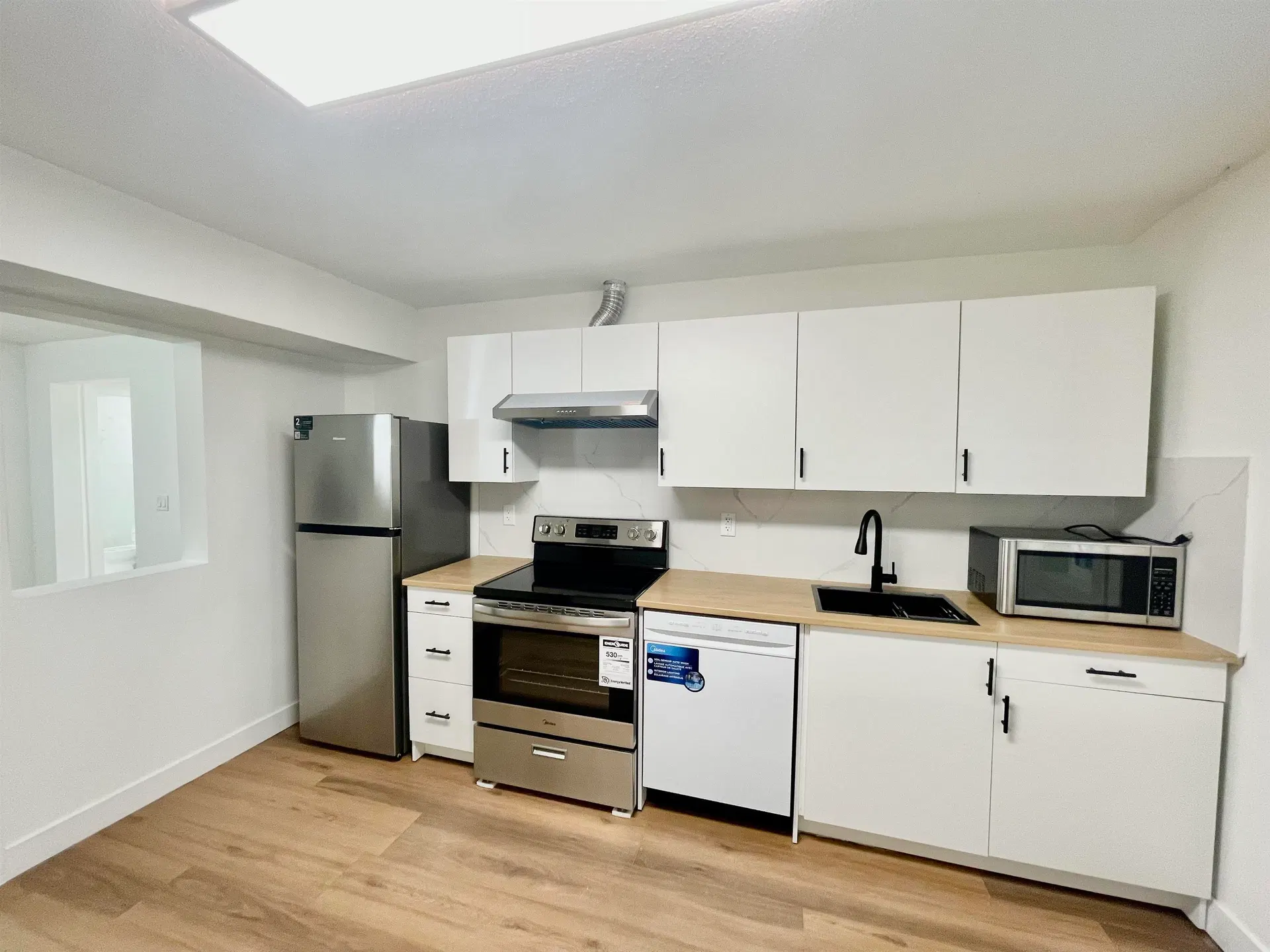 Photo 3 of 10 at lower level – 1695x 84 Avenue