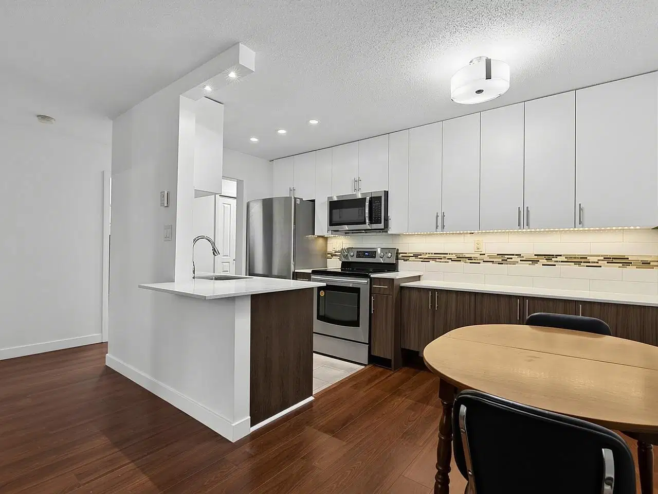 #101 – 750 7th Avenue