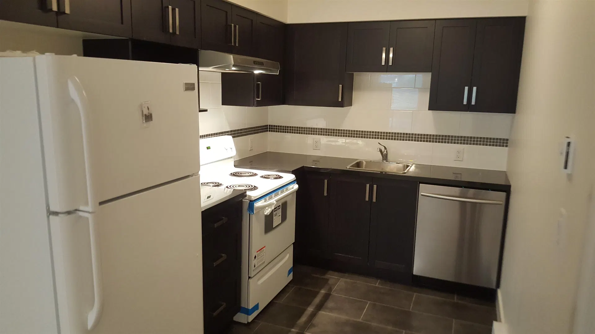 Photo 1 of 11 at Basement Suite – 3493 Bishop Place
