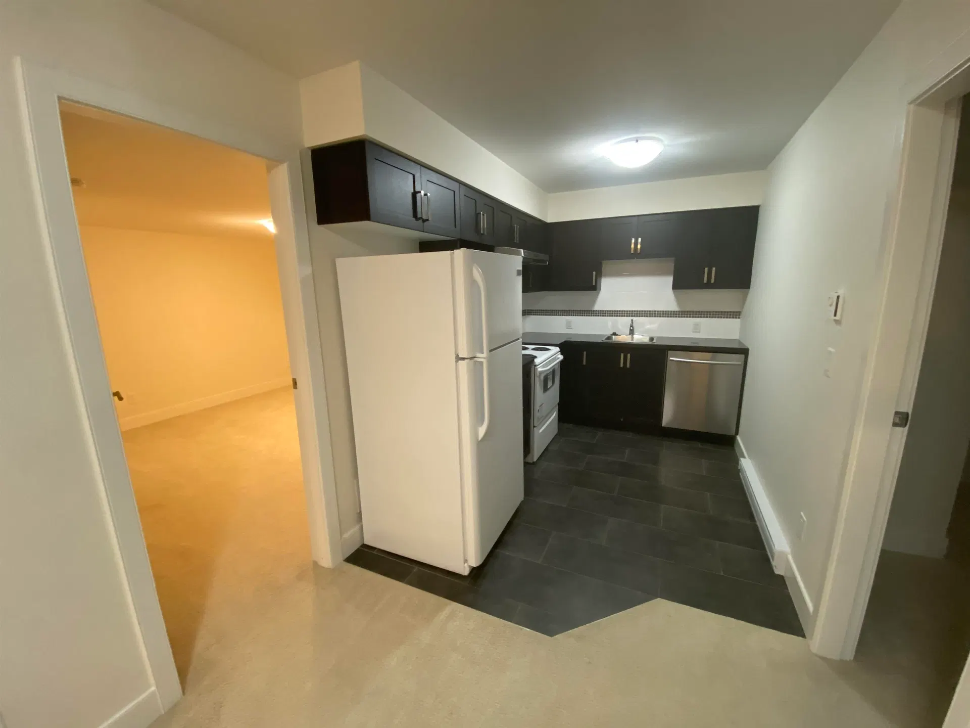 Photo 2 of 11 at Basement Suite – 3493 Bishop Place