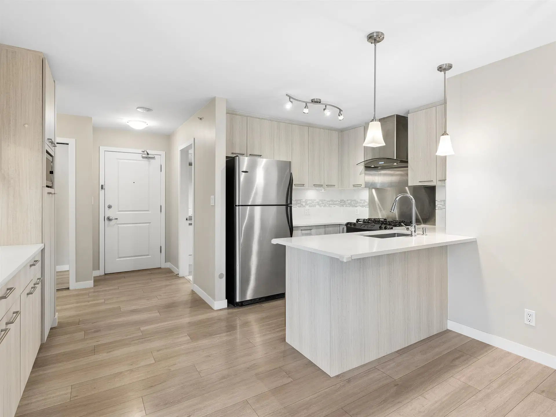 #219 – 8480 Granville Avenue