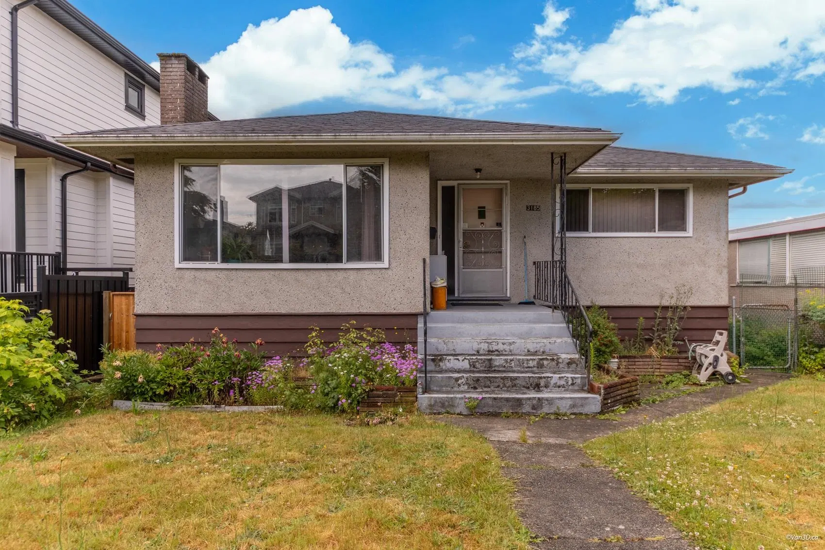Photo 1 of 28 at 3185 E 16th Avenue