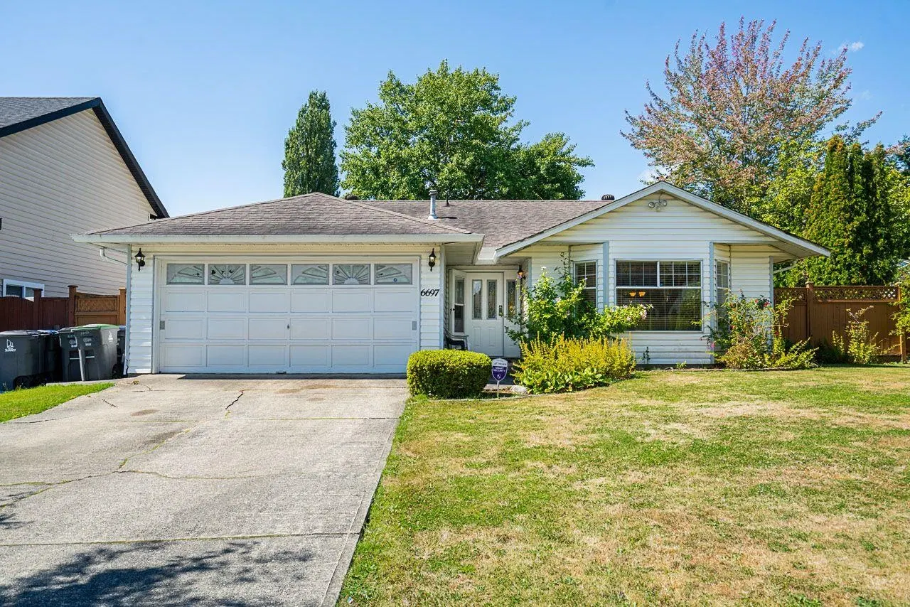 Photo 1 of 32 at 6697 141a Street