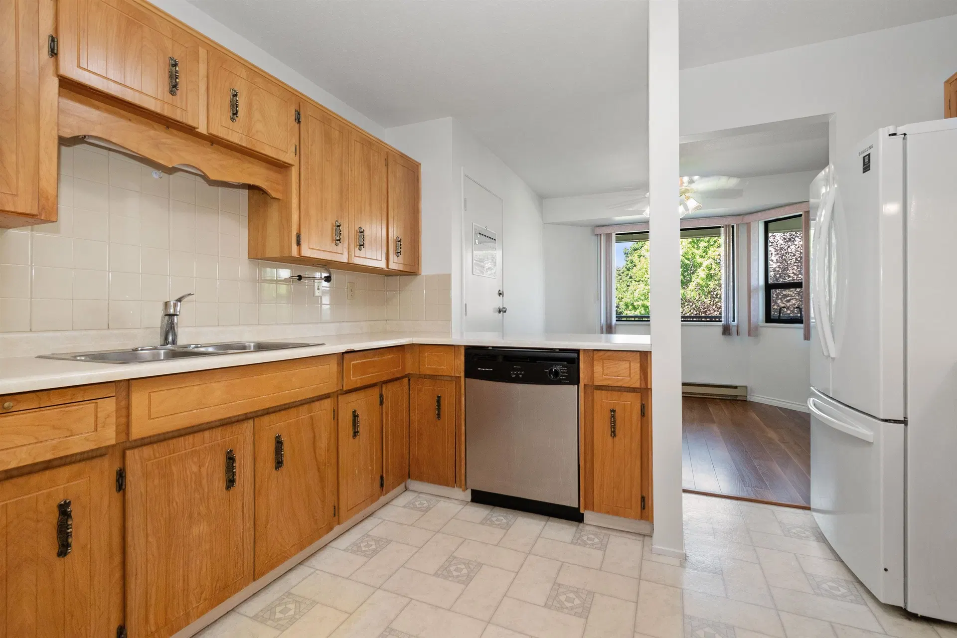 Photo 5 of 36 at #6 – 7455 Huron Street