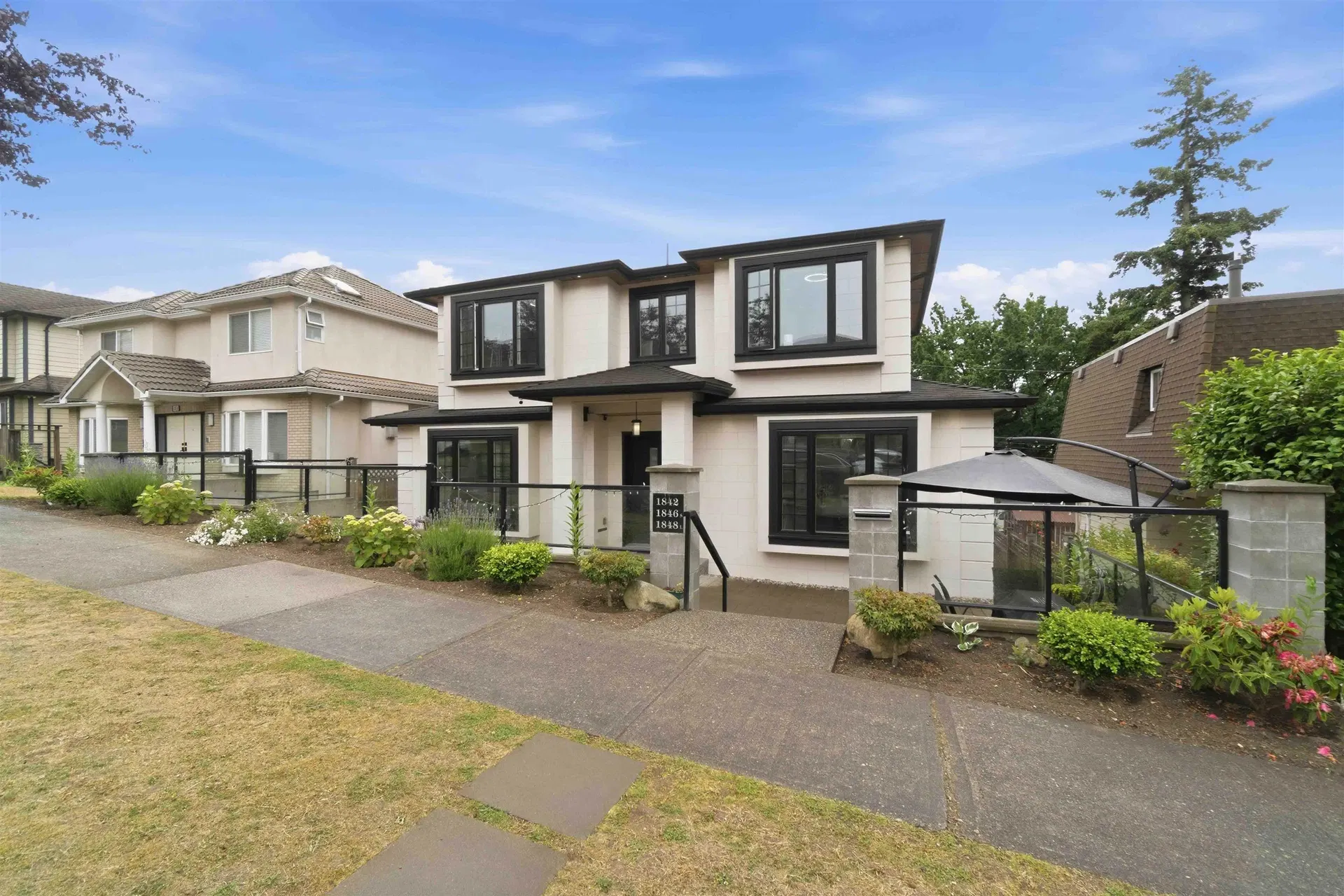 Photo 1 of 30 at 1842 E 64th Avenue